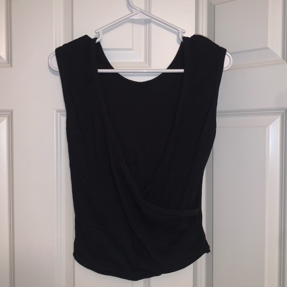 Free people top wear with v in front or back